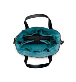 Sac à langer Storksak + Bugaboo en cuir noir (cuir avec intérieur bleu pétrole)